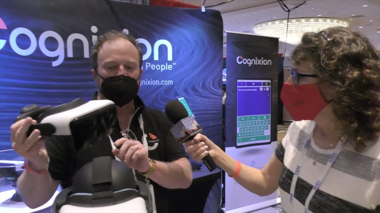 Luke demonstrating the Cognixion ONE Nexus headset during a 2022 interview.